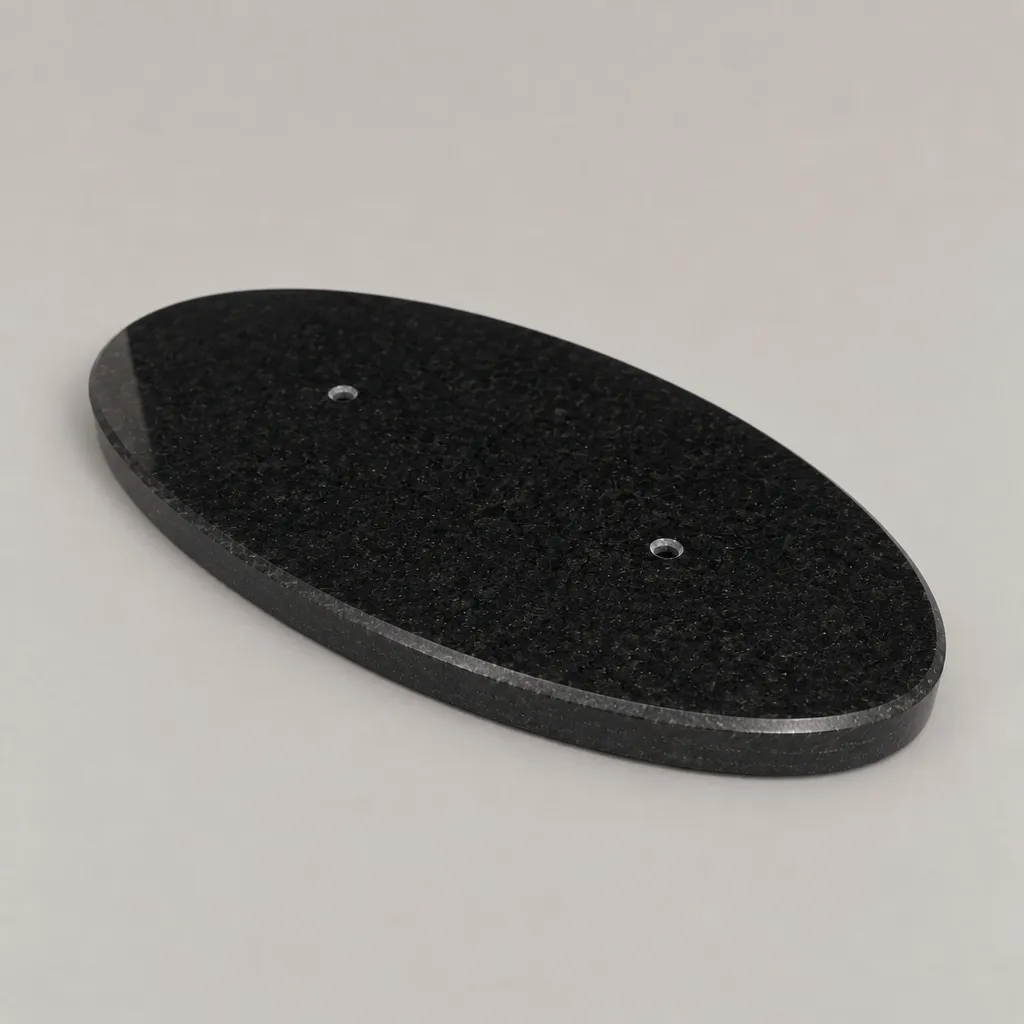 Sokkel in graniet (ovaal) 300 mm x 155 mm x 19 mm zijaanzicht.webp